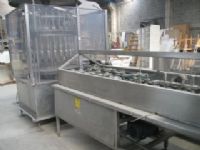 Llenadora rotativa de Liquidos y aproximadora de Botellas